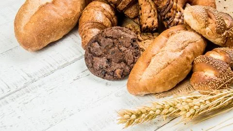 Bakery on wood white background different types of bread Stock Photos