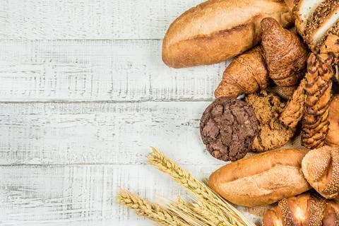 Bakery on wood white background different types of bread Stock Photos