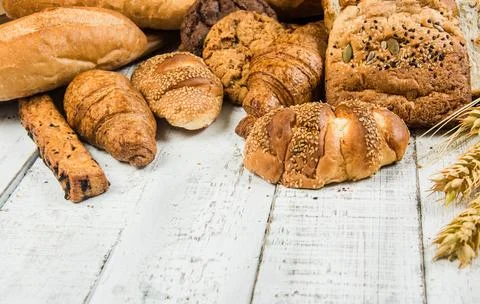 Bakery on wood white background different types of bread Stock Photos