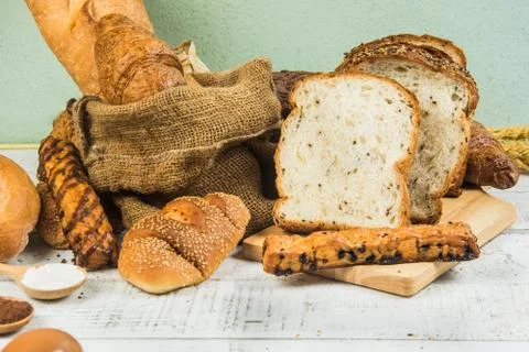 Bakery on wood white background Photos