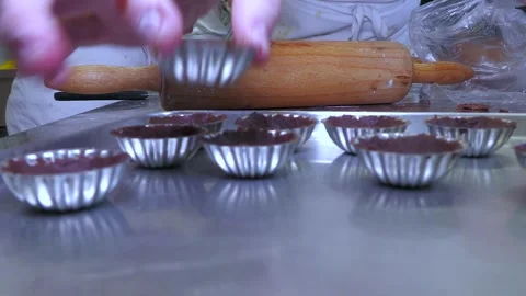 Bakery Worker Preparing Pastry in Metal Molds Video stock 345042221