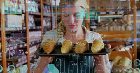 Bakery worker raising tray showing croissants for sale, inspecting while finance Stock Footage 321346816