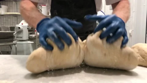 Bakery worker in slowmotion 스톡 동영상 141927390