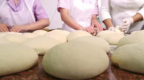 At a bakery, workers preparing cakes Stock Footage 61715344