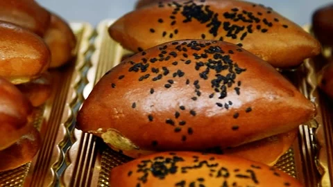 Bakery's assortment is displayed on the showcase Видео 220617779