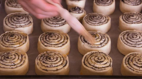 Baking background. Baker dips pastries before baking. Stock Footage 101139479