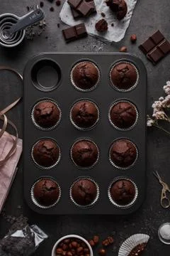 Baking background with chocolate muffins Stock Photos