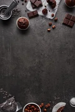 Baking background with chocolate muffins Stock Photos