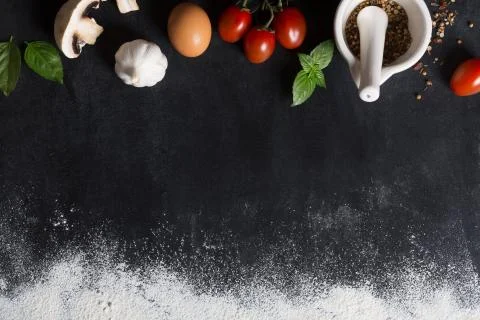 Baking background with copy space on black surface for your text. Top view. F Stock Photos
