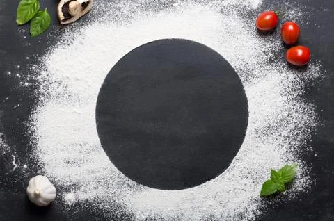 Baking background with copy space on black surface for your text. Top view. T 스톡 사진