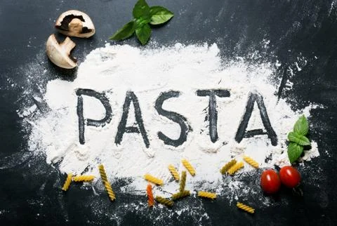 Baking background with copy space on black surface for your text. Top view. Stock Photos