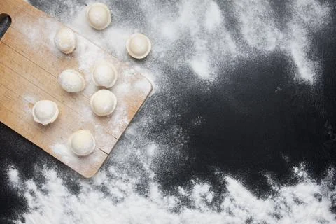 Baking background with copy space on a black surface for your text. Top view. Stock Photos