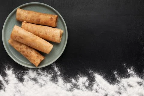 Baking background with copy space on a black surface for your text. Stock Photos