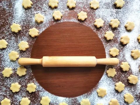 Baking background with dough, flour, rolling pin Stock Photos