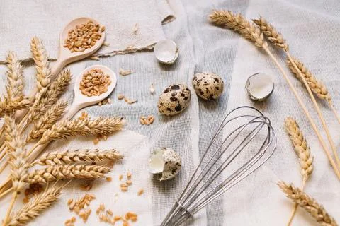 Baking background with eggs and wheat grain Stock Photos