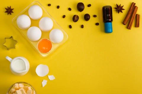 Baking background eggs butter milk spices kitchen tools Stock Photos