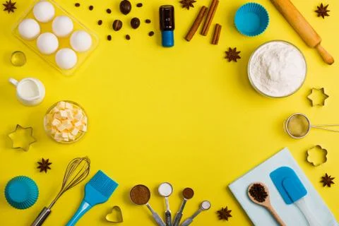 Baking background eggs flour milk spices kitchen tools Stock Photos