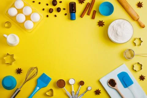 Baking background eggs flour milk spices kitchen tools Stock Photos