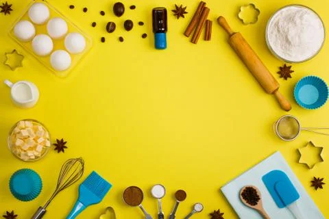 Baking background eggs flour milk spices kitchen tools Stock Photos