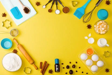 Baking background eggs flour milk spices kitchen tools Stock Photos