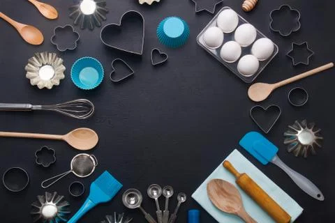 Baking background eggs kitchen tools shape cookie cutters Stock Photos