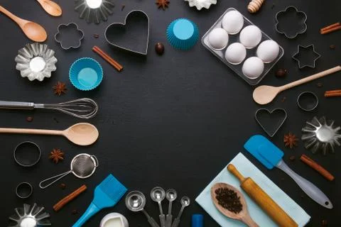 Baking background eggs kitchen tools shape cookie cutters Stock Photos