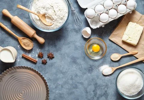 Baking background with eggshell, rolling pin. Layout free text space. Top view Stock Photos