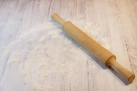 Baking background with empty copy space for text. Rolling pin and flour on Stock Photos