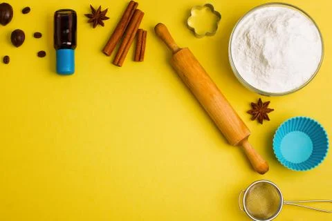 Baking background floor spices and kitchen tools Stock Photos