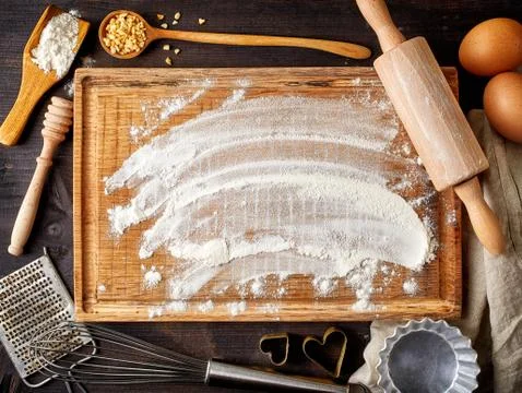 Baking background with flour, eggs and tools Stock Photos
