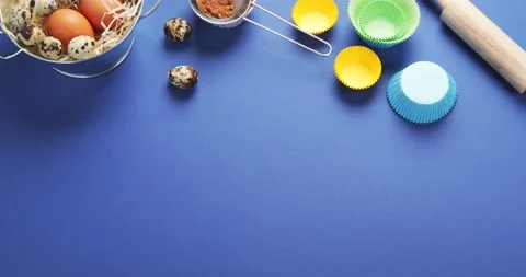 Baking  background. Ingredients, kitchen utensils for baking on blue background. Stock Footage 201395639