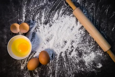 Baking background with the rolling pin with flour. On the dark table. Free sp Stock Photos
