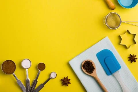 Baking background spices and kitchen tools Stock Photos