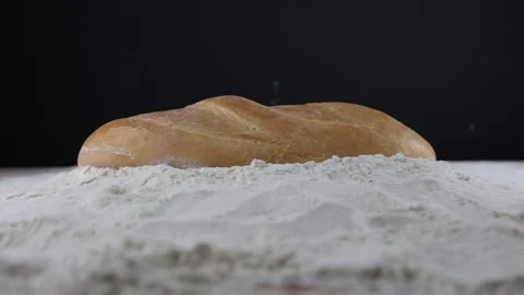 Baking. Baked bread. Bread on flour, a lot of white flour Stock Footage 232927086