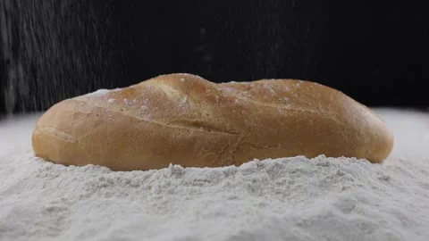 Baking. Baked bread. Bread on flour, a lot of white flour Stock Footage 232927090