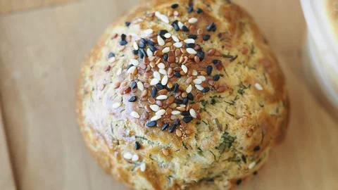 Baking bread with different seeds and herbs Stock Footage 345102108