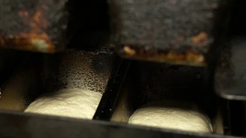 Baking bread. The dough in the forms before baking Video stock 71815121