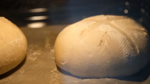 Baking bread in a high temperature oven. Slow motion. Stock Footage 121527813