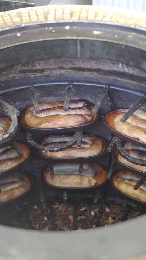 Baking bread inside a traditional oven in a local bakehouse Stock Footage 345621575