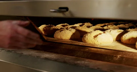 Baking bread in the oven 4K close-up. Stock Footage 221565388