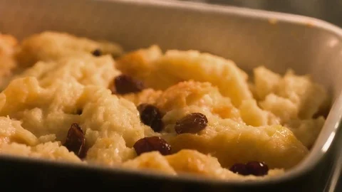 Baking bread pudding Stock Footage