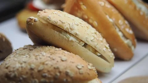 Baking bread rolls in a bakery kitchen Видео 339381899