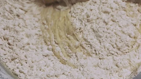Baking bread with simple ingredients using in a cozy kitchen Stock Footage 305382632
