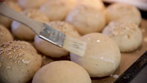 Baking buns at home slow motion Stock Footage 234706862