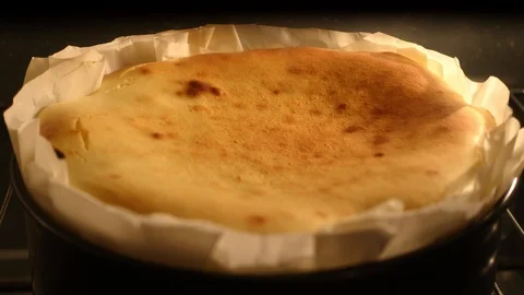 Baking Burnt Cheese Cake in Oven Time-lapse Shot. Stock Footage 129060877