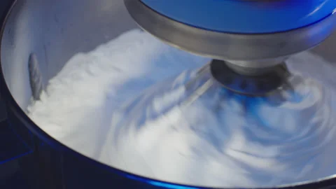 Baking a cake, close up of a working mixer in the kitchen. F Stock Footage 149123132