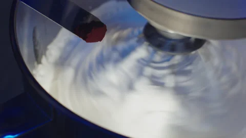 Baking a cake, close up of a working mixer in the kitchen. Stock Footage 149123183