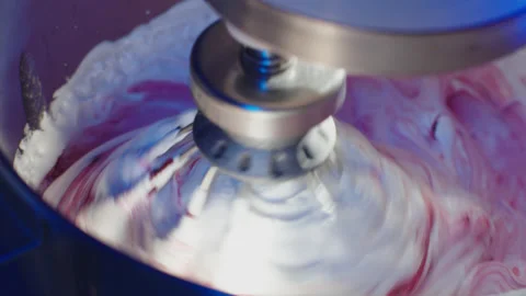 Baking a cake, close up of a working mixer in the kitchen. Stock Footage 149123329