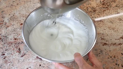 Baking a cake. The eggs are beaten. Stock Footage 94969165