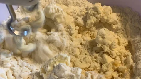 Baking cake in process. Mixing dough ingredients. Video stock 146212496